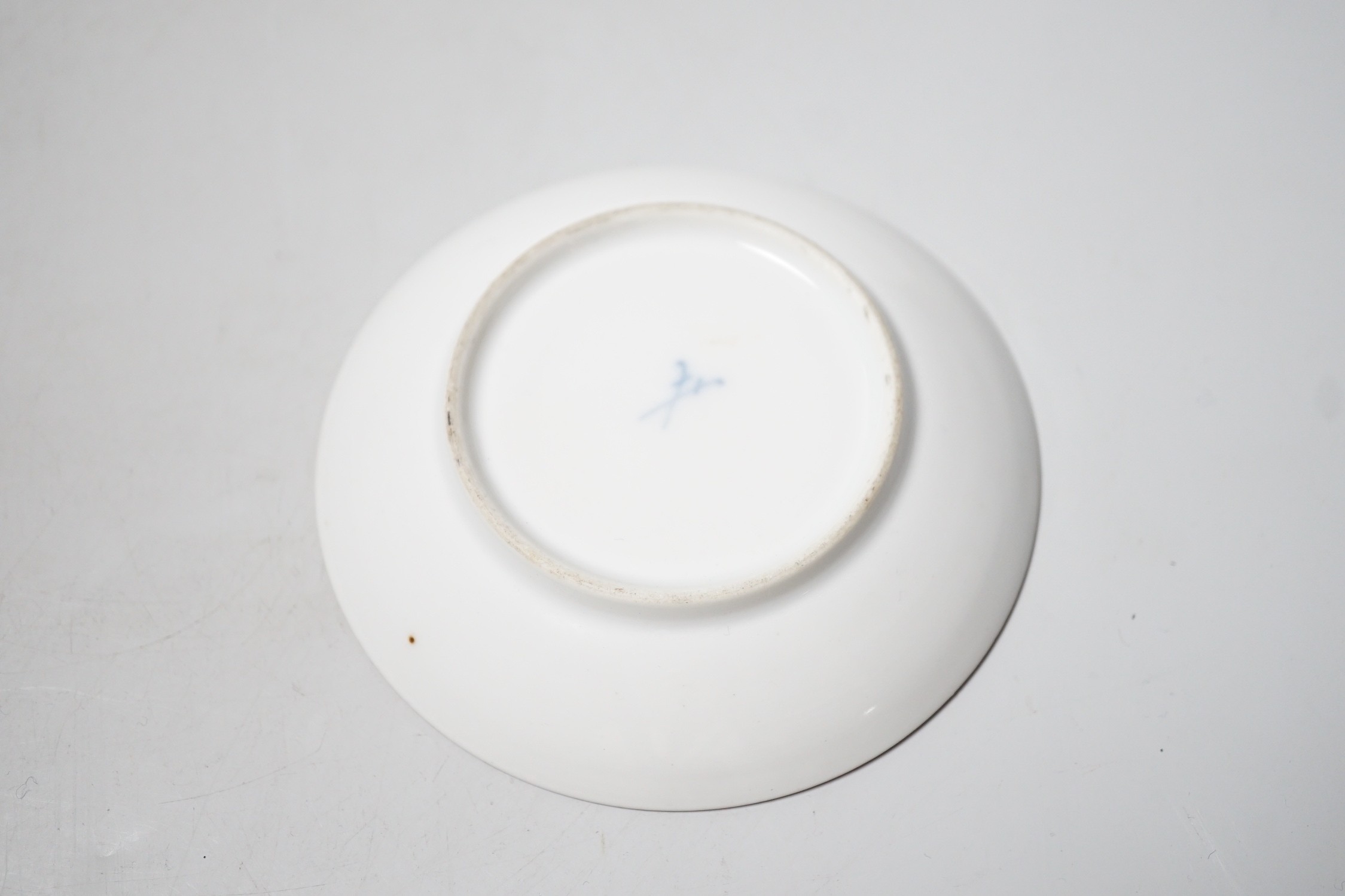 A miniature Dresden teacup and saucer in Meissen-style, cup 4.5cm
